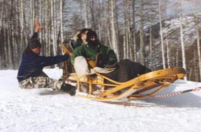 Musher Jeff Martin driving the First Turn at Krabloonik.